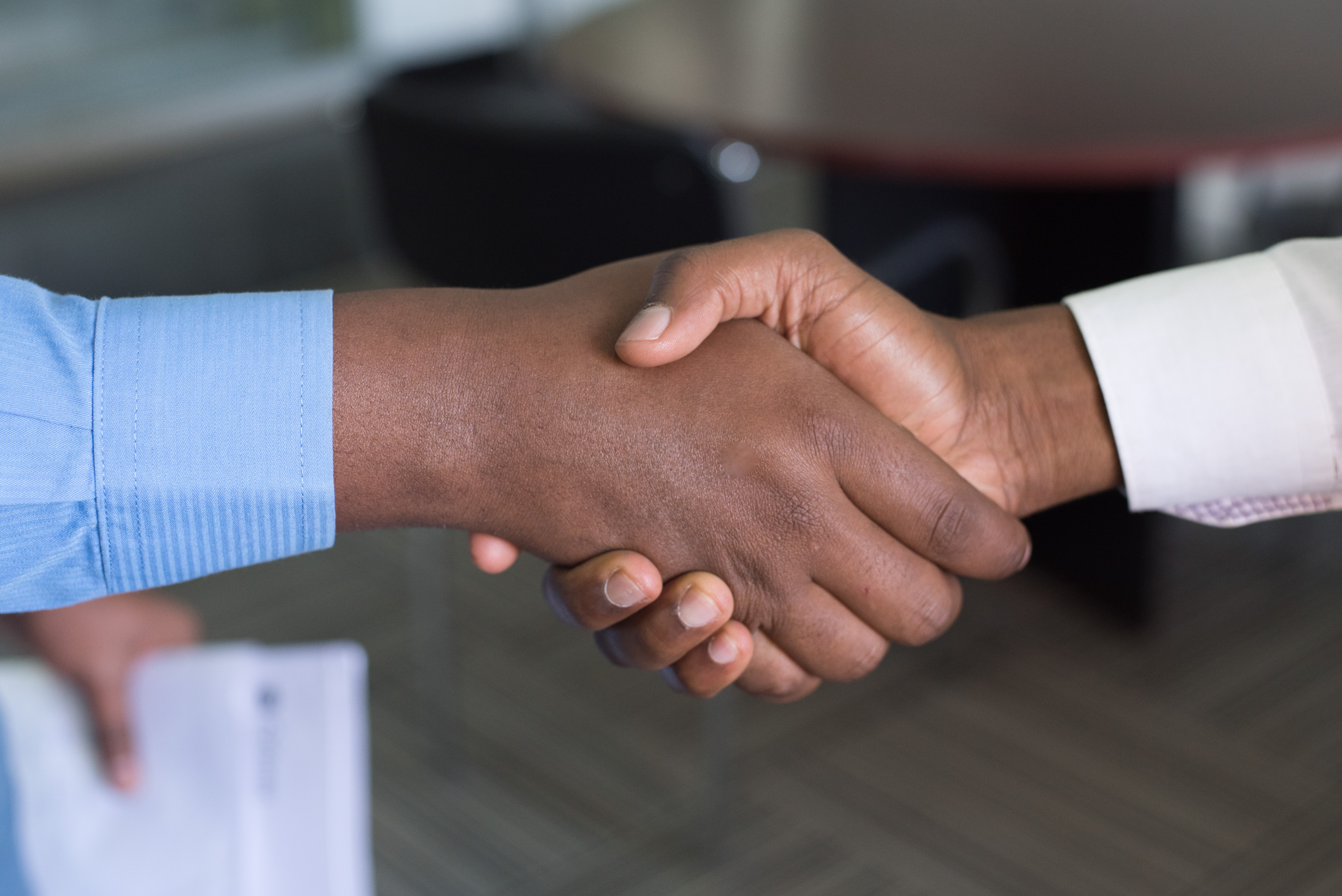 a handshake occurring between two men